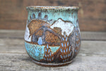 Load image into Gallery viewer, Cabin in Lupine Fields and Glacial Lake Sunset Carved Mug, 19 oz
