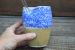 Load image into Gallery viewer, Blue Splatter and Honey Gold Straw Cup, 15 oz
