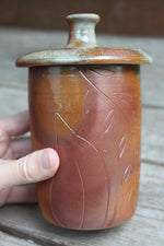 Load image into Gallery viewer, Wood Fired Garden Party Carved Lidded Jar
