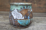 Load image into Gallery viewer, Cabin in Lupine Fields and Glacial Lake Sunset Carved Mug, 19 oz
