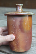 Load image into Gallery viewer, Wood Fired Garden Party Carved Lidded Jar
