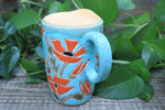 Load image into Gallery viewer, Poppy Party Carved Handled Travel Mug, 16 oz
