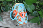 Load image into Gallery viewer, Poppy Party Carved Handled Travel Mug, 16 oz
