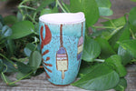 Load image into Gallery viewer, Lobster Lovers Handled Travel Mug, Red Lobster with Pink, Yellow, Purple and White Buoys - 16 oz
