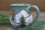 Load image into Gallery viewer, Snowy Cabin Forest Days Carved Mug, 19 oz
