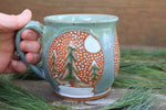 Load image into Gallery viewer, Evergreen Forest Snow Globe Dreams Mug, 16 oz
