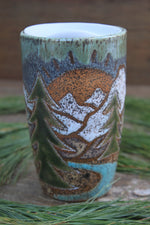 Load image into Gallery viewer, Distant Mountain and Evergreen Days Carved Handled Travel Mug, 19 oz
