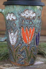 Load image into Gallery viewer, Tulip Fields and Sun Showers Carved Travel Mug, 18 oz
