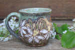 Load image into Gallery viewer, Daffodil Fields and Mountain Lake Carved Mug, 18 oz

