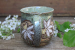 Load image into Gallery viewer, Daffodil Fields and Mountain Lake Carved Mug, 18 oz
