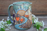 Load image into Gallery viewer, Glacial Lake/River and Wildflower Fields Sunset Pitcher, 64 oz
