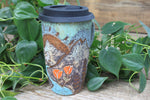 Load image into Gallery viewer, Glacial River and Wildflower Fields Carved Travel Mug, 18 oz
