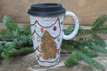 Load image into Gallery viewer, Twinkly Lights and Large Evergreens Handled Travel Mug, 17 oz
