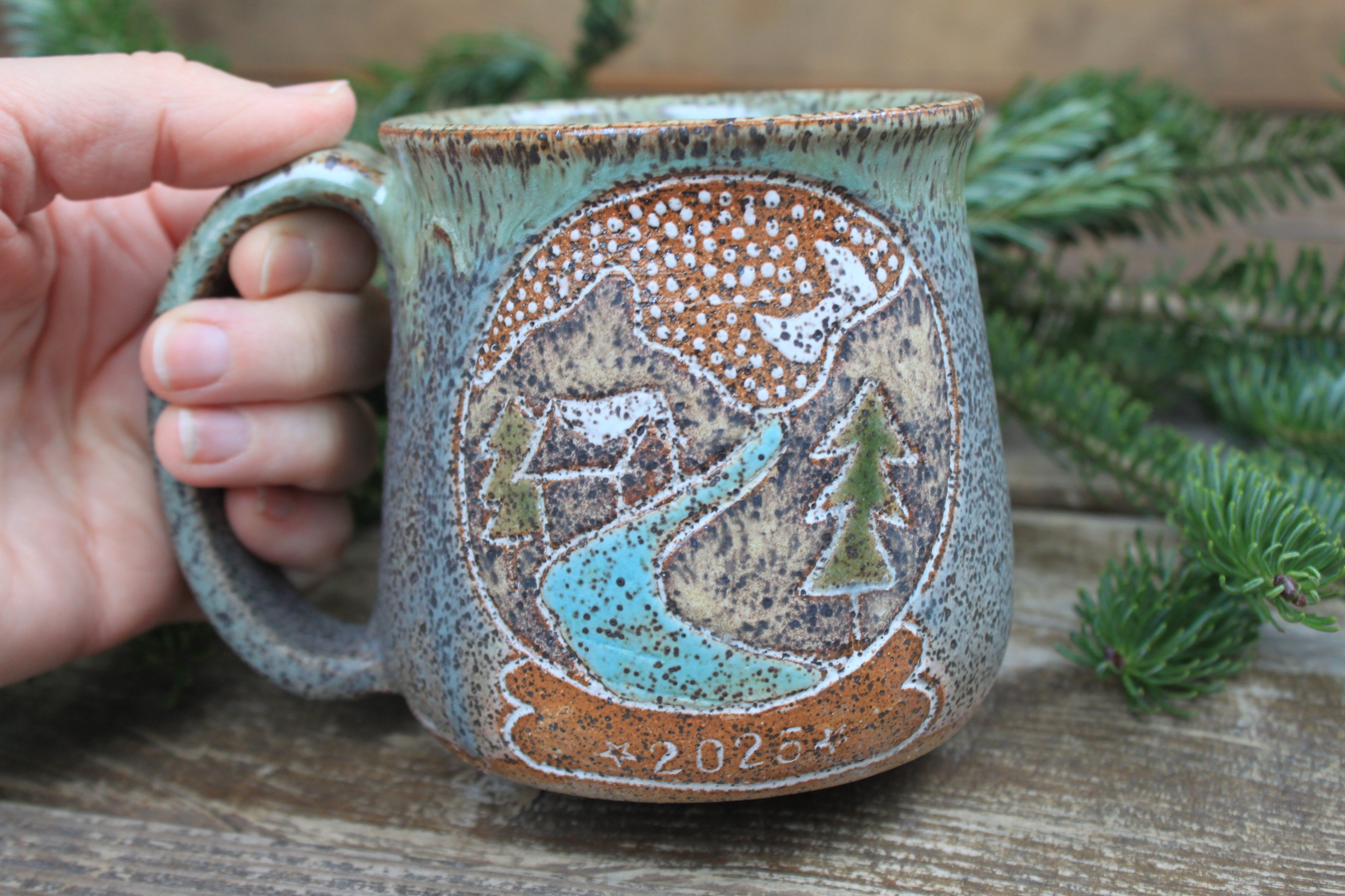 Distant Mountain Snow Globe Dreams Carved Mug, 16 oz