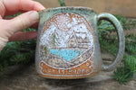 Load image into Gallery viewer, Distant Mountain Snow Globe Dreams Carved Mug, 16 oz
