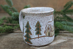 Load image into Gallery viewer, Snowy Cabin in Evergreen and Holly Grove Mug, 19 oz
