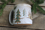 Load image into Gallery viewer, Snowy Cabin in Evergreen and Holly Grove Mug, 19 oz
