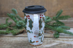 Load image into Gallery viewer, Twinkly Lights, Holly and Evergreens Handled Travel Mug, 19 oz
