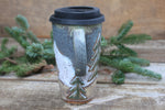 Load image into Gallery viewer, Snowy Cabin Forest Travel Mug, 19 oz
