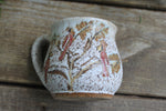 Load image into Gallery viewer, Cardinals in a Snowy Forest Mug, 17 oz
