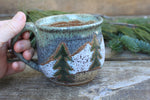 Load image into Gallery viewer, Snowy Cabin, Evergreens and Glacial Lakes Mug, 15 oz
