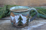 Load image into Gallery viewer, Snowy Cabin, Evergreens and Glacial Lakes Mug, 15 oz
