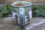 Load image into Gallery viewer, Snowy Cabin, Evergreens and Rolling River Mug, 19 oz
