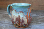 Load image into Gallery viewer, Carved Desert Mountain Sunset Mug, 23 oz
