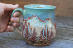 Load image into Gallery viewer, Carved Desert Mountain Sunset Mug, 23 oz
