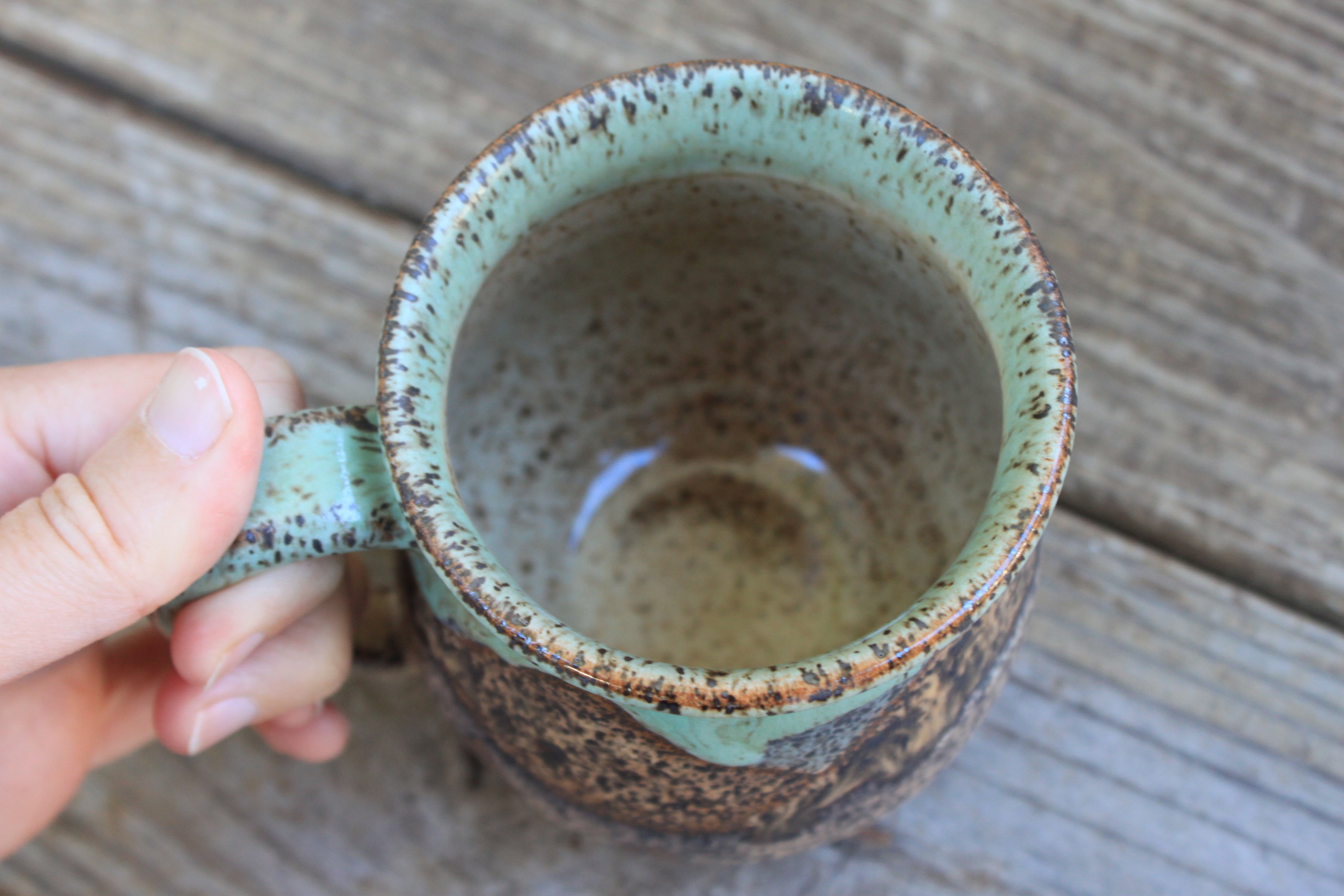 Biking to a Distant Stony Mountain Sunset Mug, 17 oz