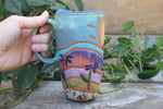 Load image into Gallery viewer, Rainbow Fields and Cone Flower Dreams Handled Travel Mug, 17 oz
