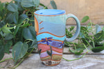 Load image into Gallery viewer, Rainbow Fields and Cone Flower Dreams Handled Travel Mug, 17 oz
