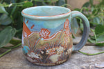 Load image into Gallery viewer, Beachy Sand Dune Sunset and Sailboat Mug, 18 oz
