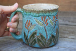 Load image into Gallery viewer, Bird of Paradise Turquoise Carved Mug, 21 oz
