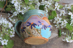 Load image into Gallery viewer, Coneflower Fields and Rolling River Mug, 16 oz
