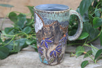 Load image into Gallery viewer, Glacial River and Coneflower Fields Carved Travel Mug, 18 oz
