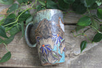 Load image into Gallery viewer, Glacial River and Coneflower Fields Carved Travel Mug, 18 oz
