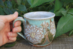 Load image into Gallery viewer, Delightful Dahlias Carved Mug, White, 15 oz

