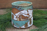 Load image into Gallery viewer, Snowy Cabin Forest and Glacial Lake Sunset Carved Mug, 19 oz
