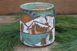 Load image into Gallery viewer, Snowy Cabin Forest and Glacial Lake Sunset Carved Mug, 19 oz
