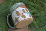 Load image into Gallery viewer, Snowy Cabin Forest and Glacial Lake Sunset Carved Mug, 19 oz
