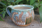 Load image into Gallery viewer, Gorgeous Gourds Carved Mug, 17 oz
