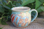 Load image into Gallery viewer, Foliage Frolic Carved Mug, 15 oz
