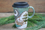 Load image into Gallery viewer, Snowy Cabin Forest Nights Carved Handled Travel Mug, 16 oz
