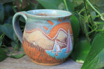 Load image into Gallery viewer, Beachy Sand Dune Sunset and Sailboats Carved Mug, 18 oz
