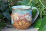 Load image into Gallery viewer, Beachy Sand Dune Sunset and Sailboats Carved Mug, 18 oz
