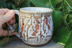 Load image into Gallery viewer, Snowy Cabin with Cardinals in a Birch Forest Mug, 18 oz
